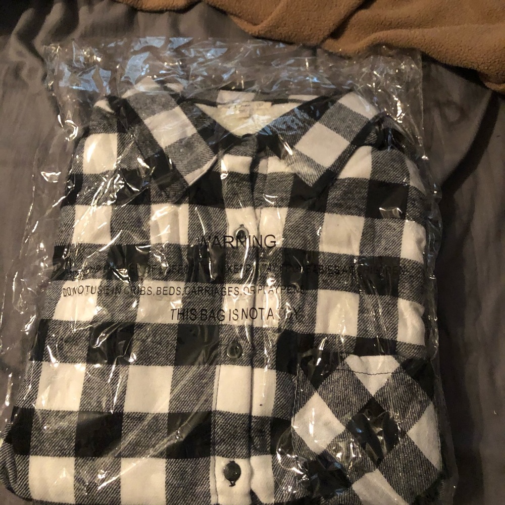 Buffalo plaid button up. Smoke free home.